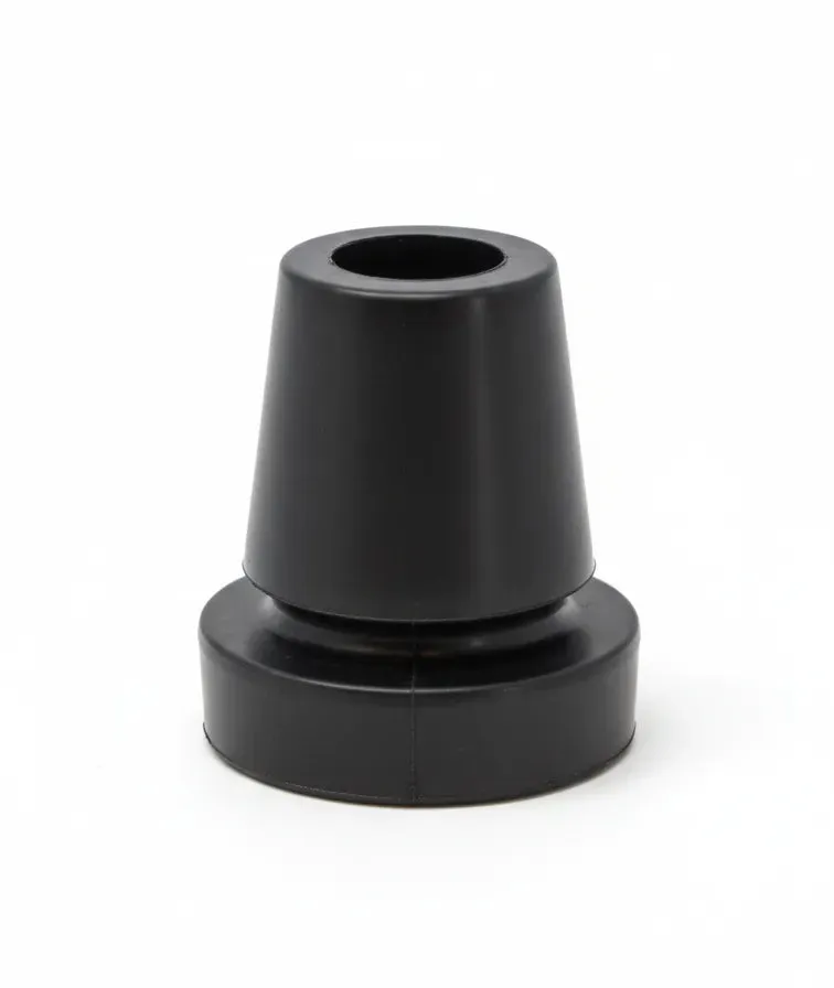 Close-up of the articulating crutch tip, showing the flared rubber tip above its separate pivoting base disc